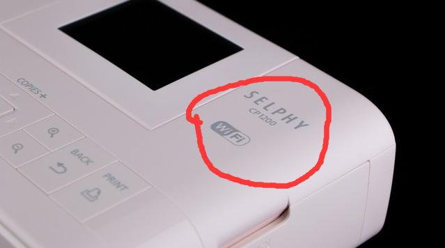 佳能selphycp1200墨盒取不出来,佳能selphycp910使用方法