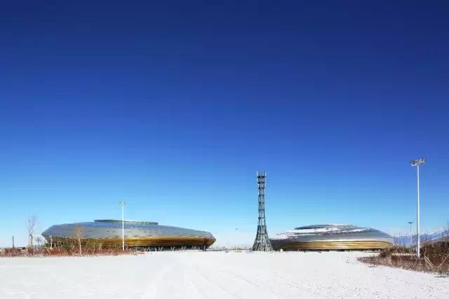 梅洪元丝路花谷孕育寒地建筑第十三届全国冬季运动会冰上运动中心