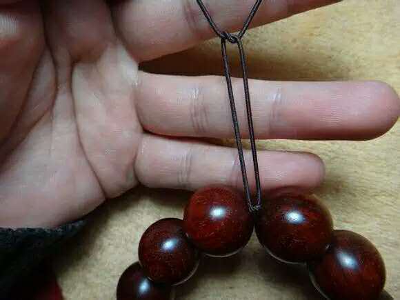 紫檀佛塔打结,小叶紫檀手串侧挂佛头打结方法