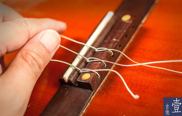 北航吉他,如何换吉他新弦