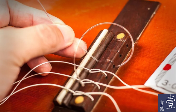 北航吉他,如何换吉他新弦