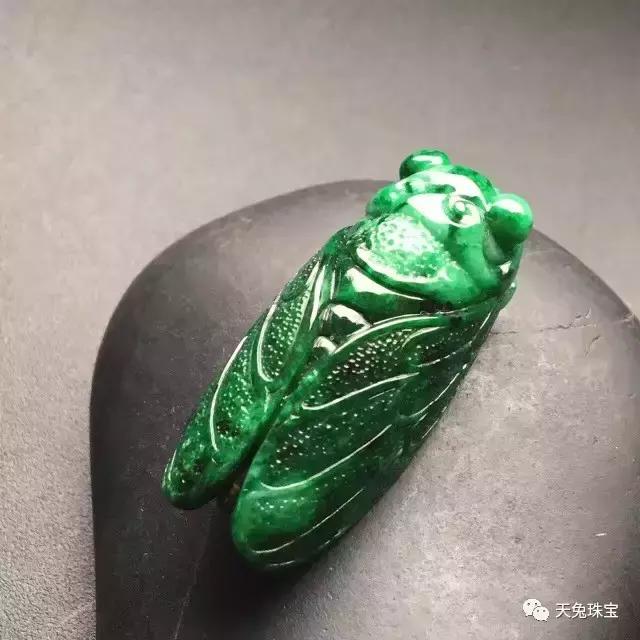 翡翠雕刻太阳轮的寓意,翡翠雕刻锦灰堆的寓意