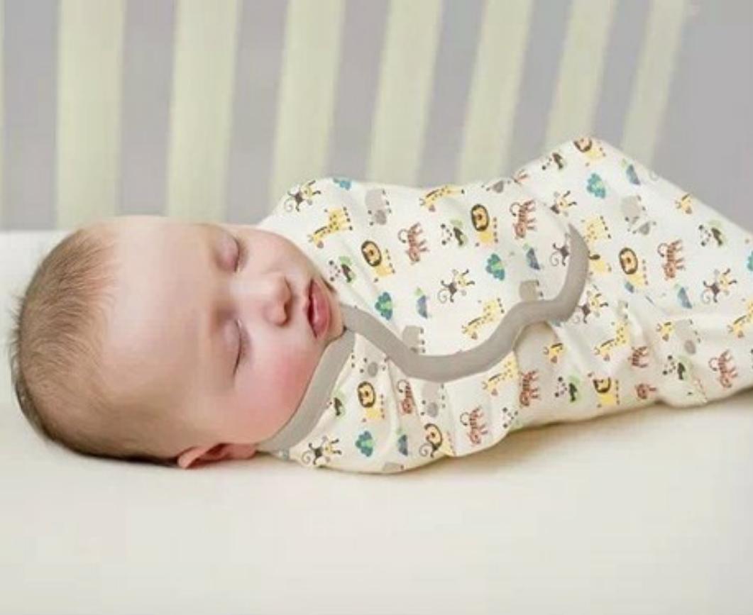 如何包裹新生儿正确姿势,两个月婴儿如何包裹睡得踏实