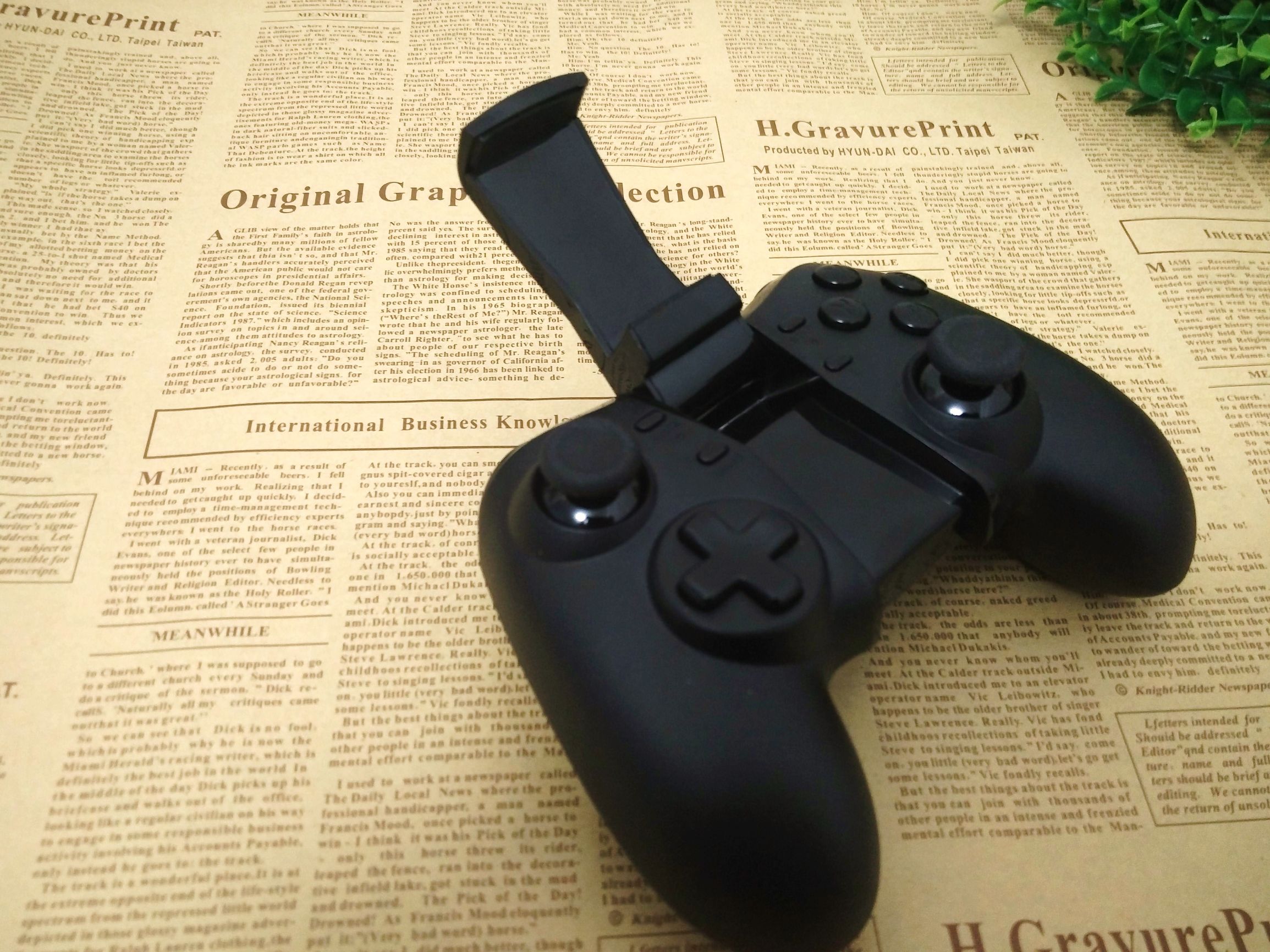 q1游戏手柄怎么样,新游智能游戏手柄q1pro