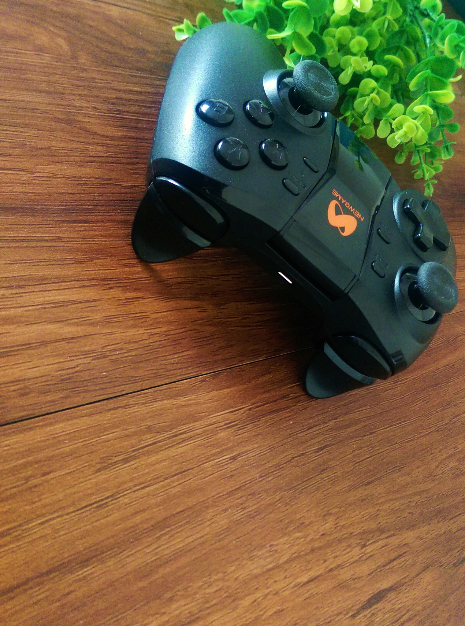 q1游戏手柄怎么样,新游智能游戏手柄q1pro