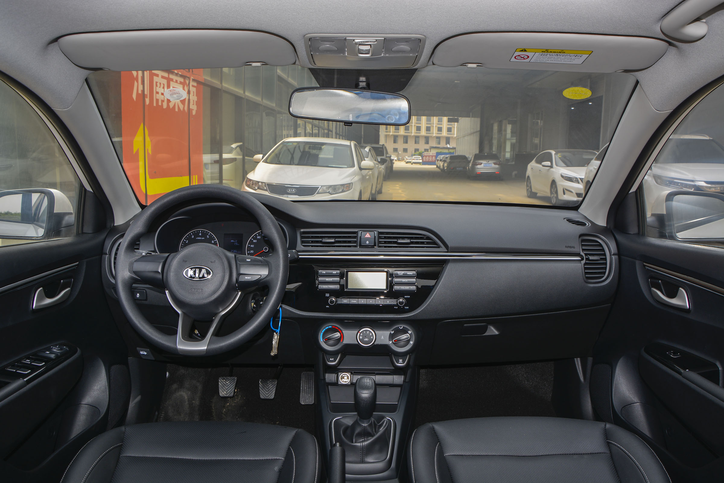 起亚k2顶配功能,二手车起亚k2买多少配置