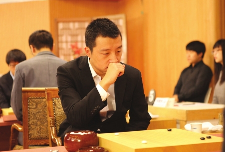 古力小时候学棋故事,围棋古力年轻的照片