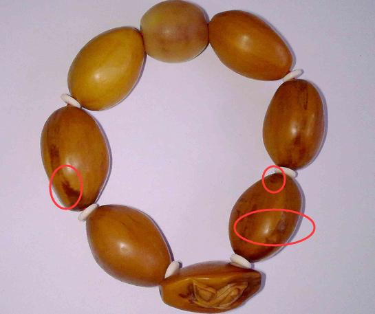 核雕常见瑕疵,核雕定制单籽出现瑕疵