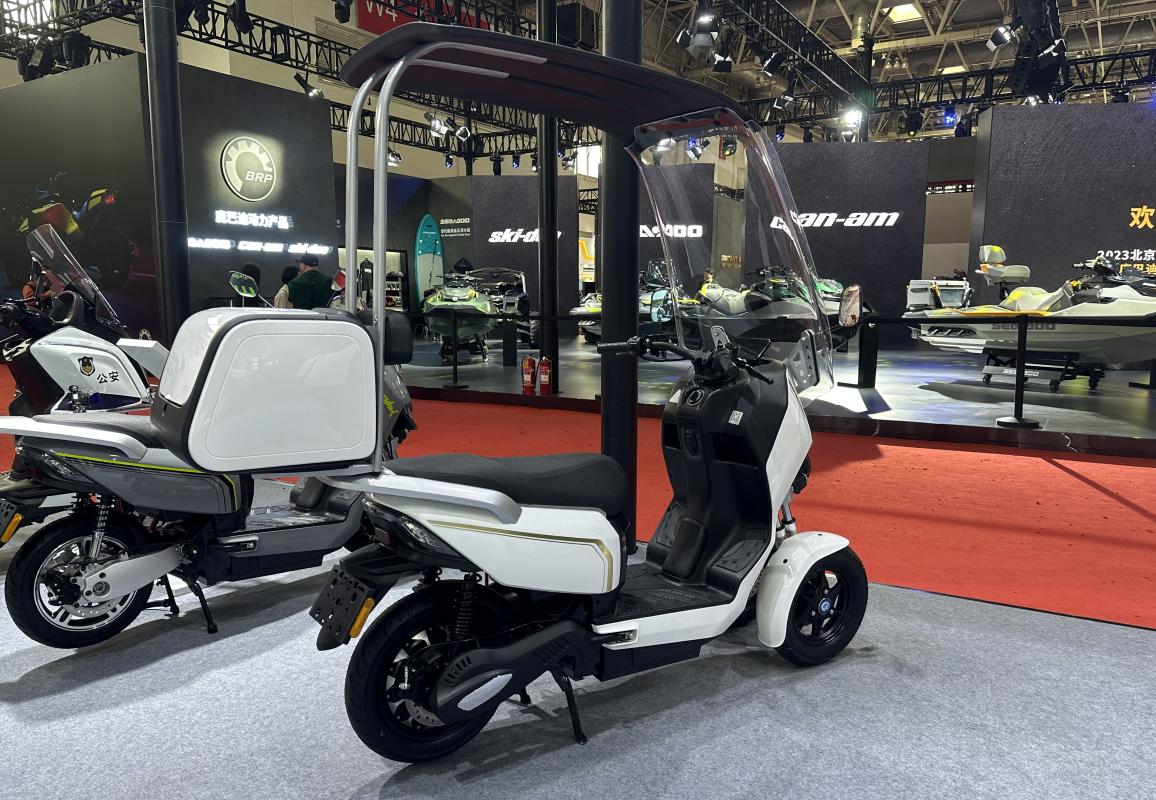 斗风s110倒三轮北京摩博会,摩展吸睛斗风倒三轮电动新物种