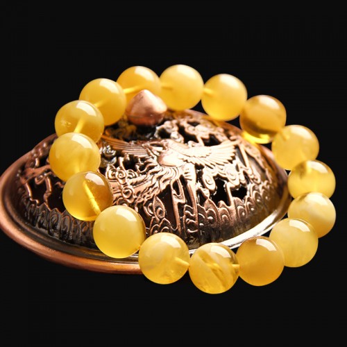 蜜蜡的功效与作用佩戴蜜蜡的好处,蜜蜡是鸡油黄的好还是白花蜜蜡好