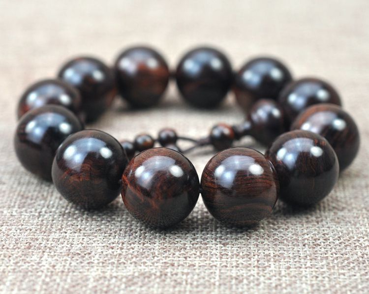 海南黄花梨芝麻点如何鉴别图,怎么鉴别海南黄花梨手串真假