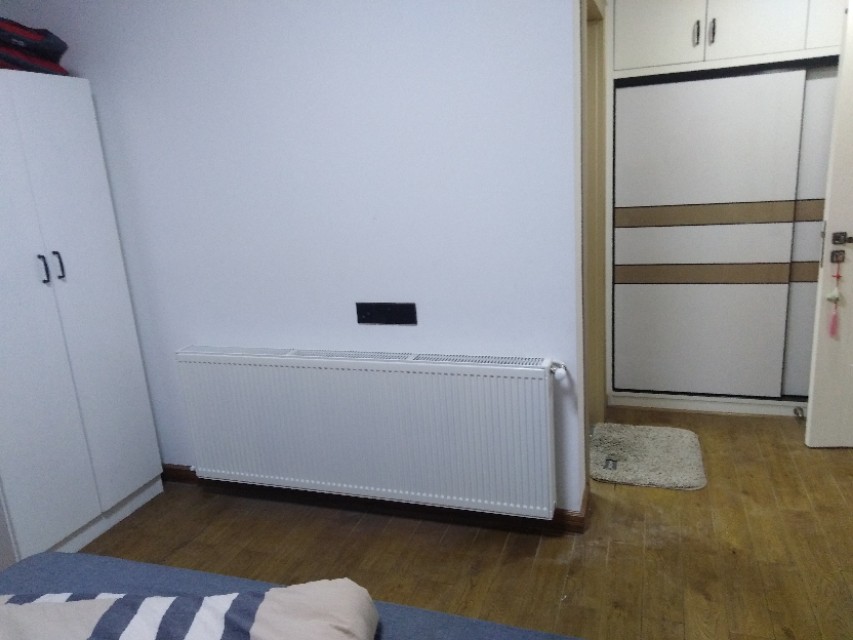 长沙装暖气片和地暖哪个好,长沙河西明装暖气片安装