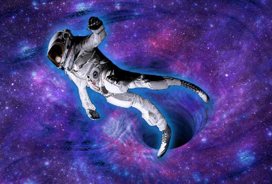 黑洞里面是另一个宇宙吗,如果掉进黑洞会掉进哪个位置