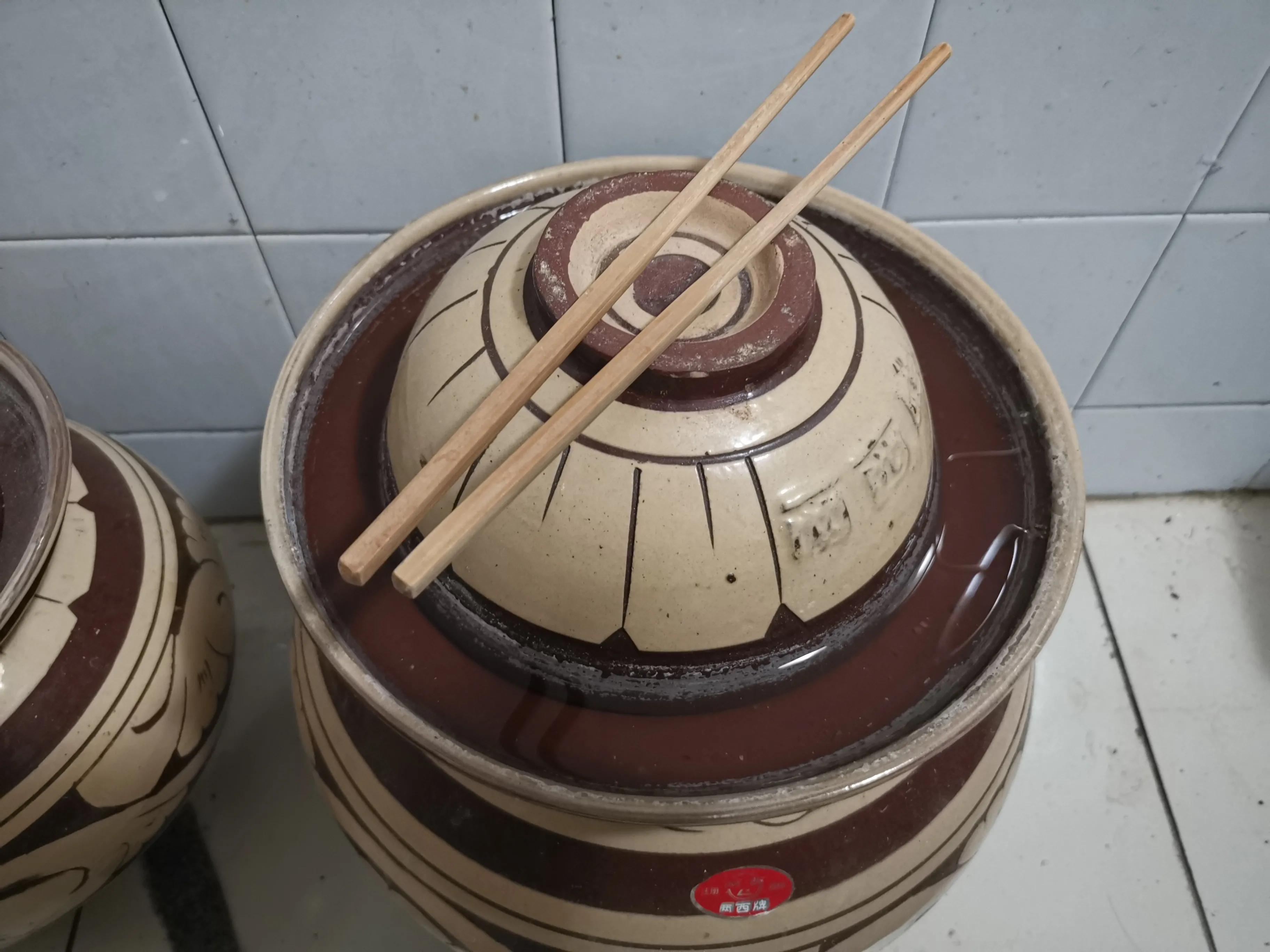 我用芥菜腌的酸菜软了咋回事,泡菜坛做酸菜水变少