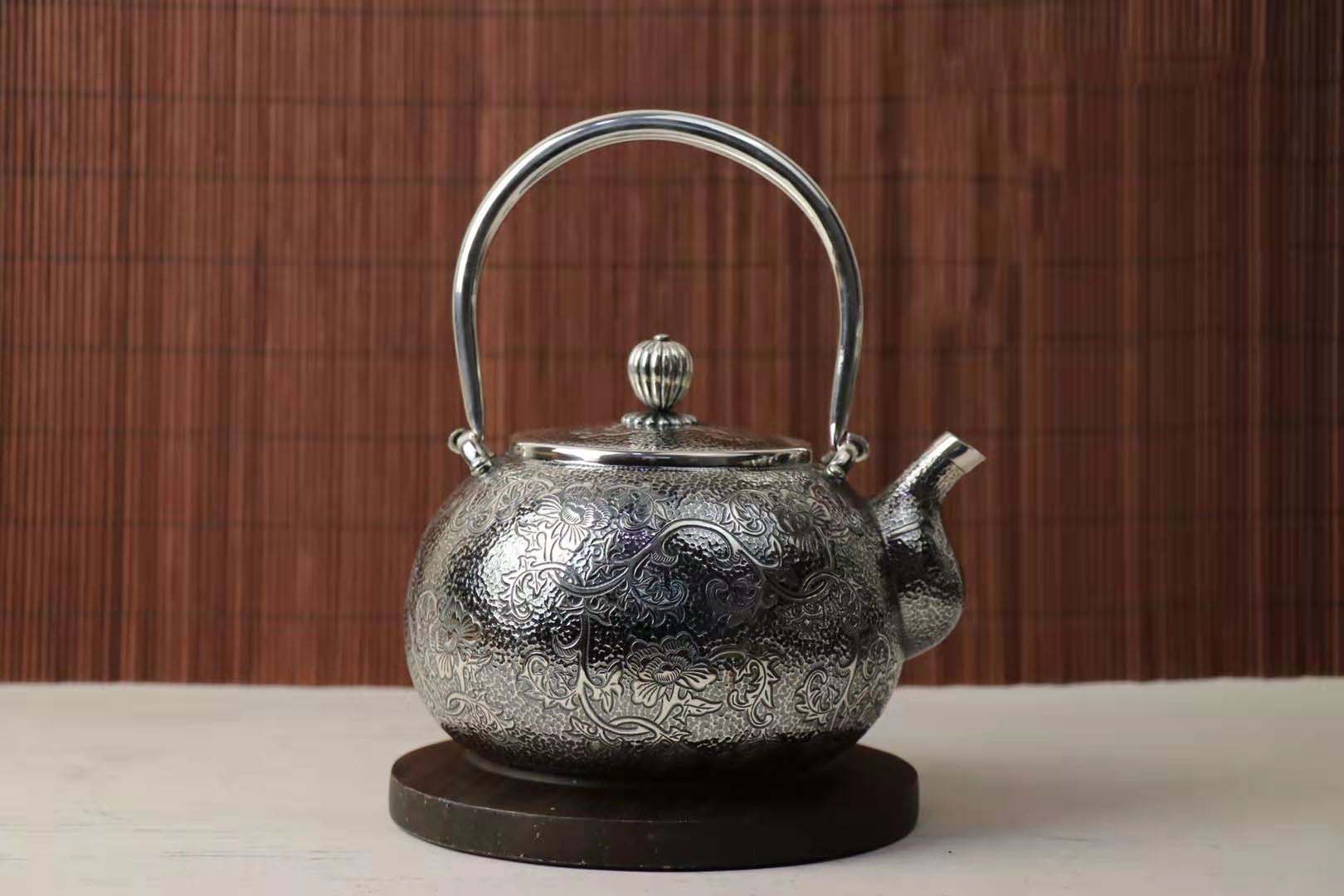 银壶买做旧还是本色,紫皮银壶和做旧银壶