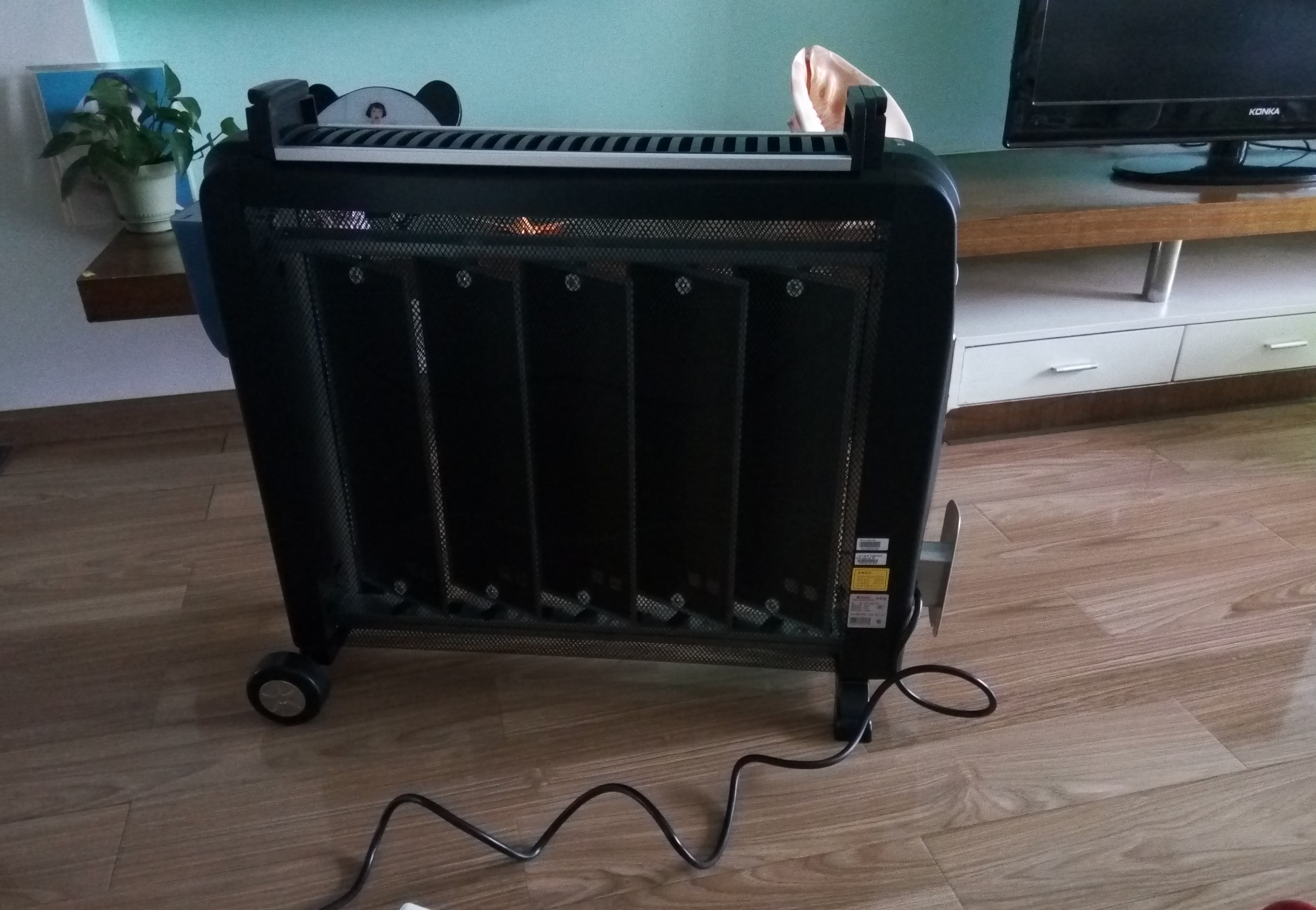 取暖器哪种油汀最好,取暖器用暖风机好还是快热炉好