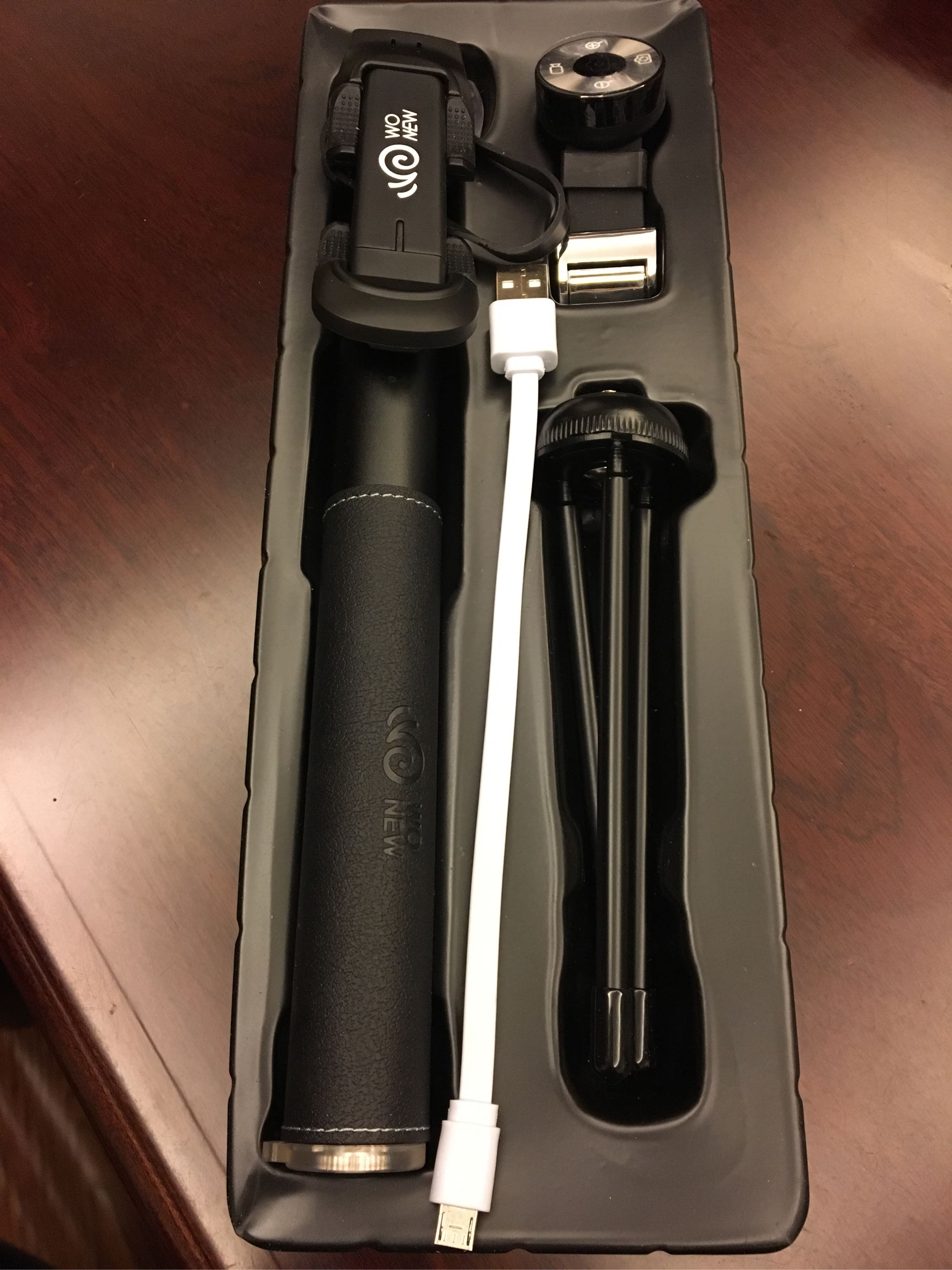 手机通用自拍杆怎么样使用,多功能自拍杆可以试用任何相机吗