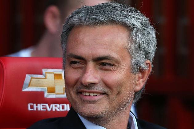 我有一个特别喜欢的老师,一个喜欢足球的体育老师