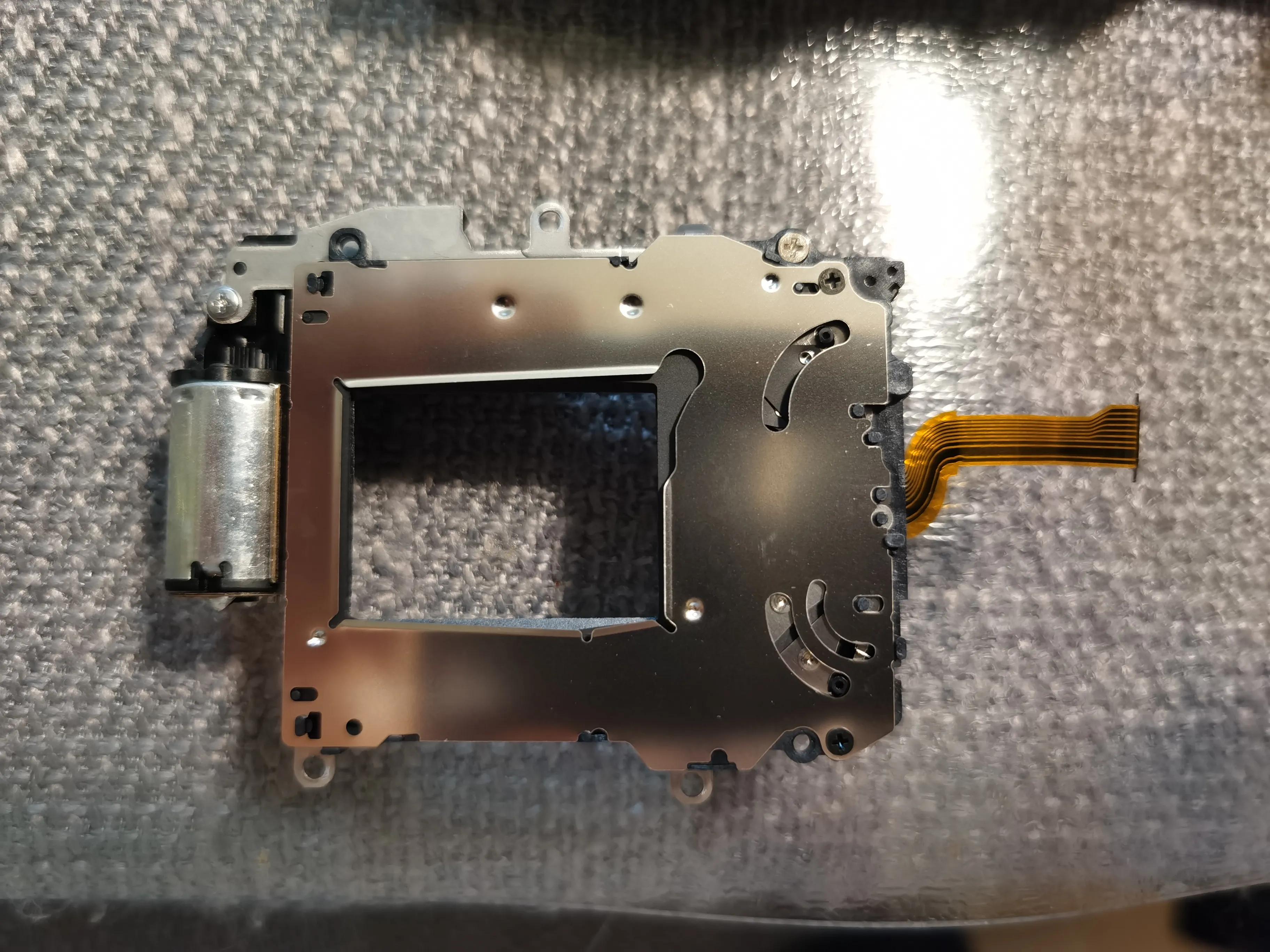 索尼相机更换快门组件,索尼微单相机电池盖拆卸教程