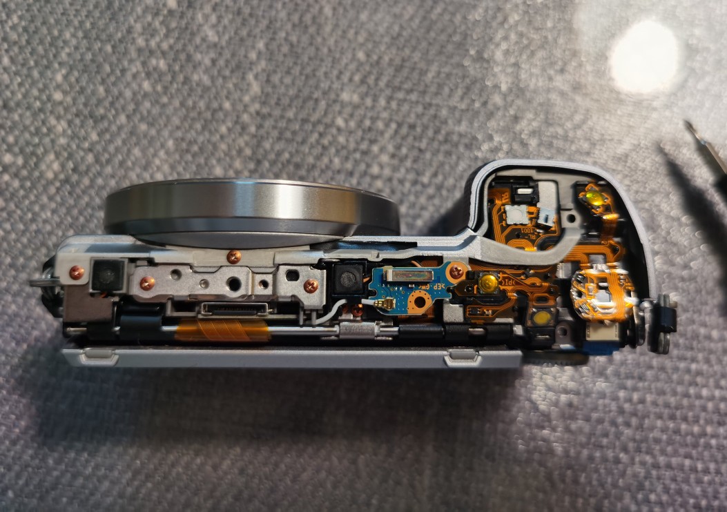 索尼相机更换快门组件,索尼微单相机电池盖拆卸教程