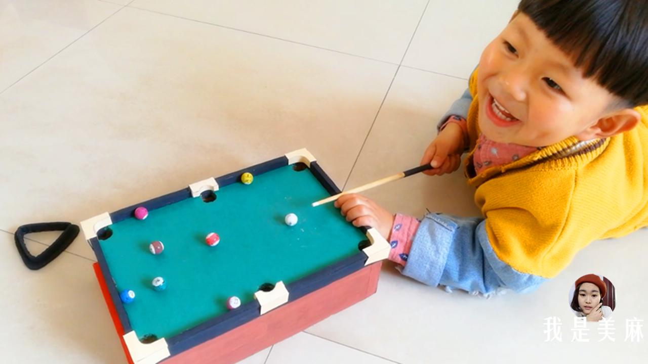 用纸箱给孩子做玩具简单的,爸爸用纸箱给孩子做玩具