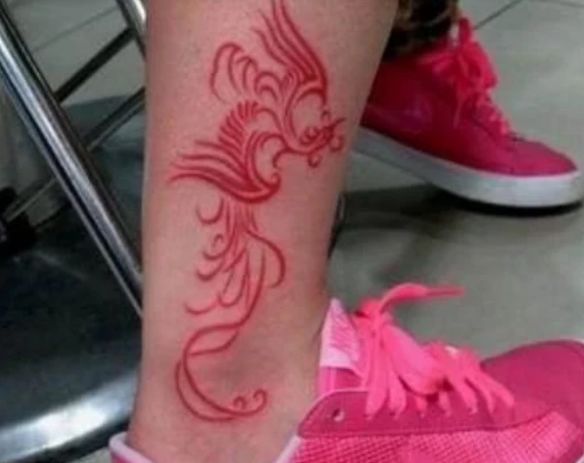 用鸽子血纹身会怎么样,鸽子血纹身喝酒才能看出来吗