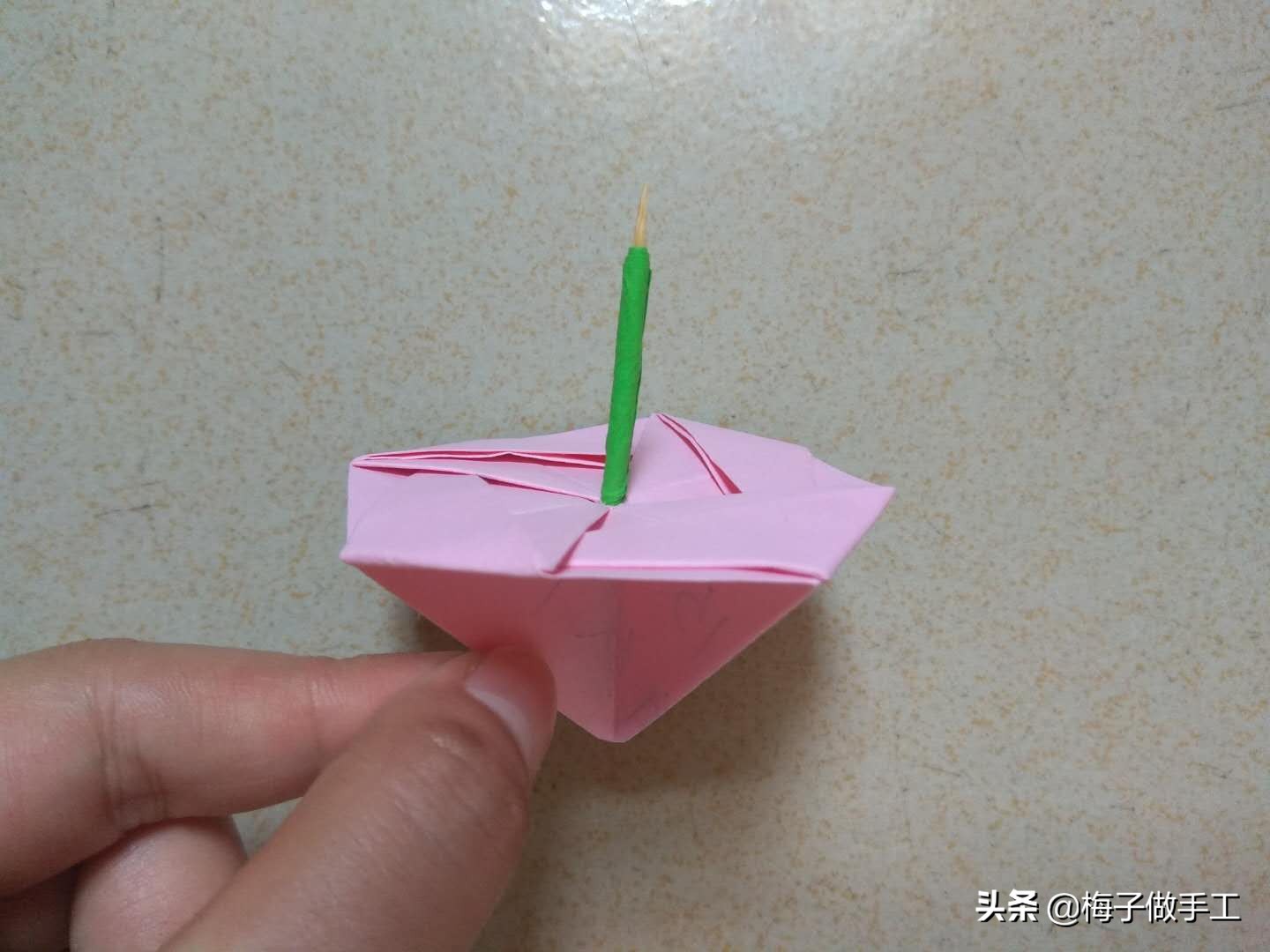 折纸手工陀螺简单一张纸,折纸陀螺一张纸做法最简单