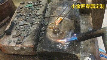 黄金火烧后变黑是什么原因,用火烧黄金变黑是假黄金吗