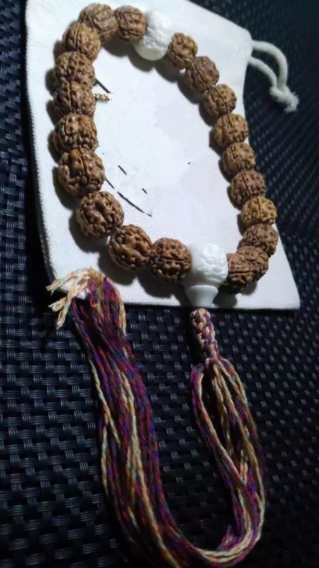 无绳结手串打结方法,文玩核桃手串绳结打法