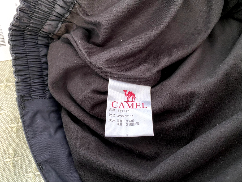 加绒冲锋裤男款正品专卖骆驼,骆驼加绒宽松冲锋裤