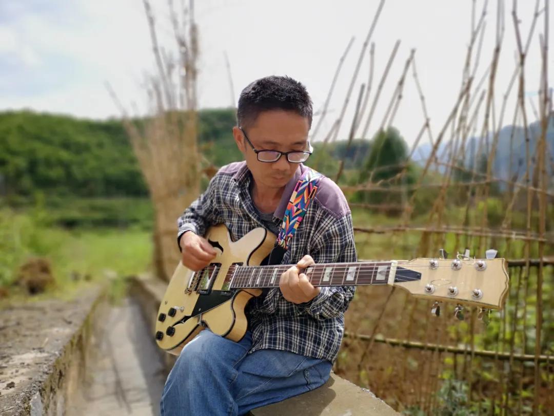 张家界吉他手工制作,张家界手工吉他