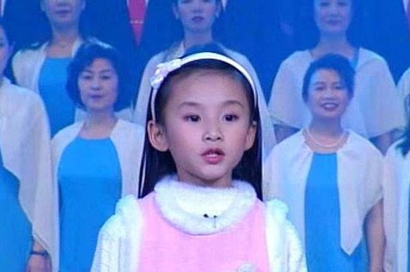 澳门七子之歌容韵琳99年春晚,七子之歌龙紫岚和容韵琳演唱区别