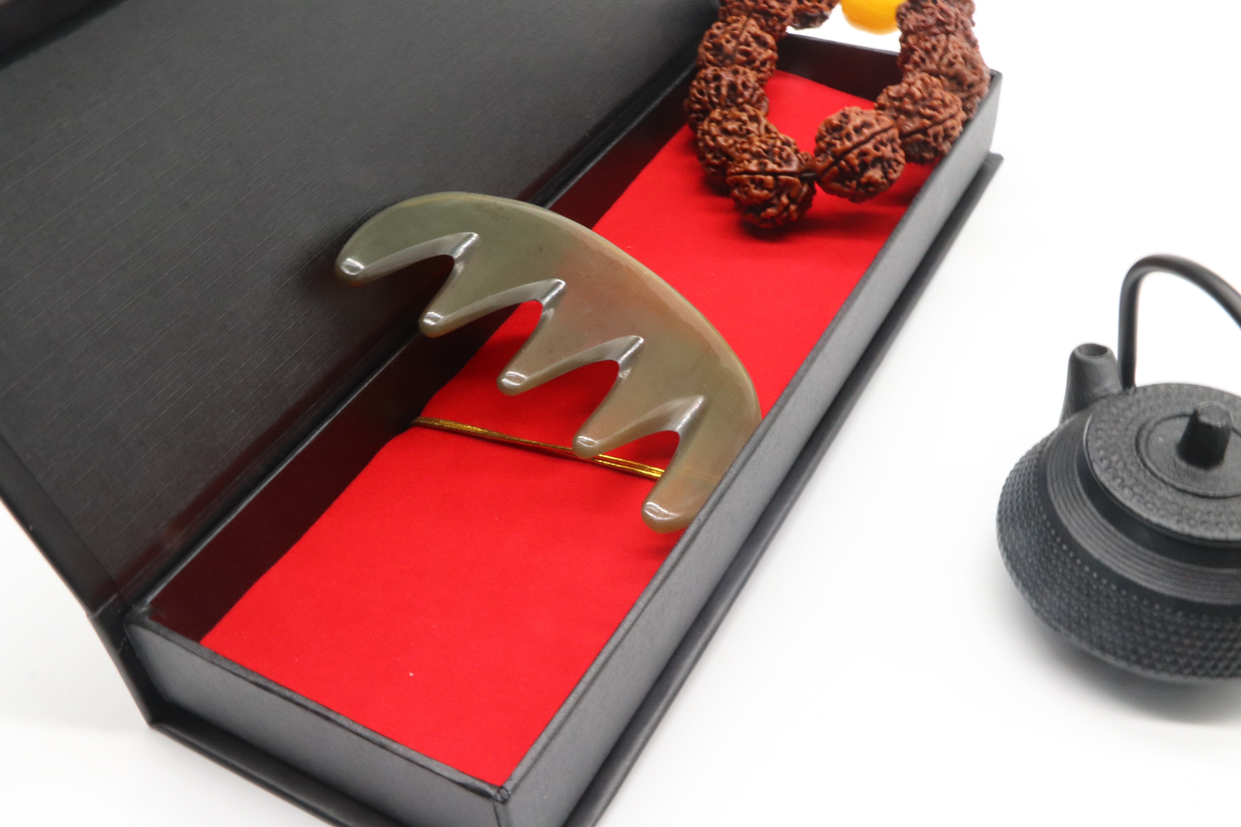 牛角梳价格一般多少,白水牛角梳真假图片