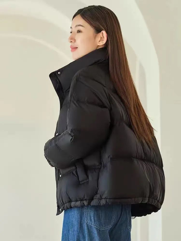 白色长款羽绒服韩系裙子穿搭,今年流行穿搭羽绒服加什么靴子