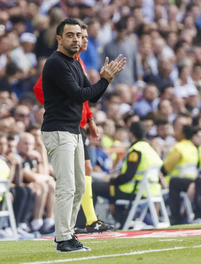 哈维当教练赢皇马的反应,哈维当巴萨教练首秀