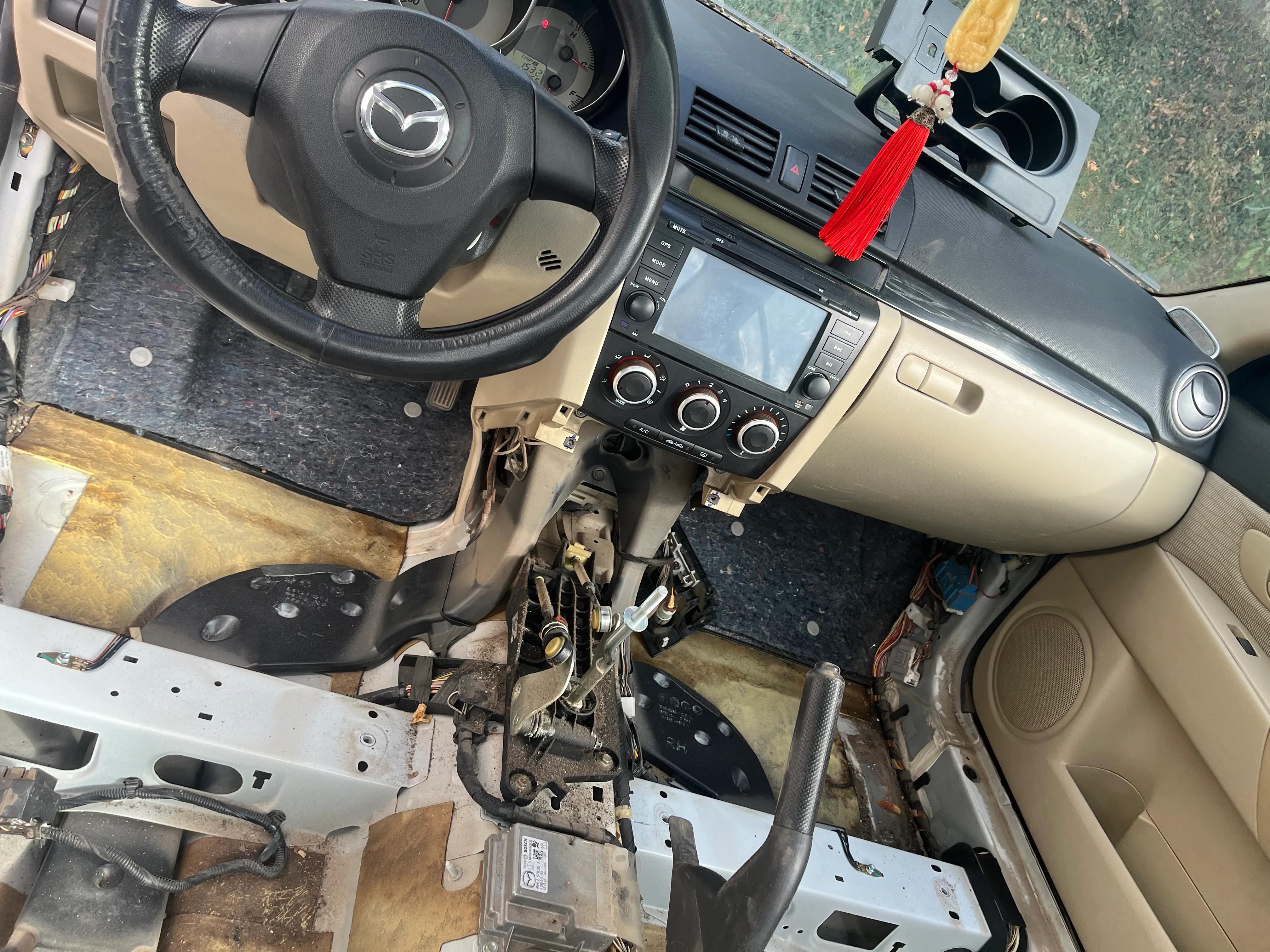 2010款马自达3经典款油耗,经典马自达3近光灯泡更换视频