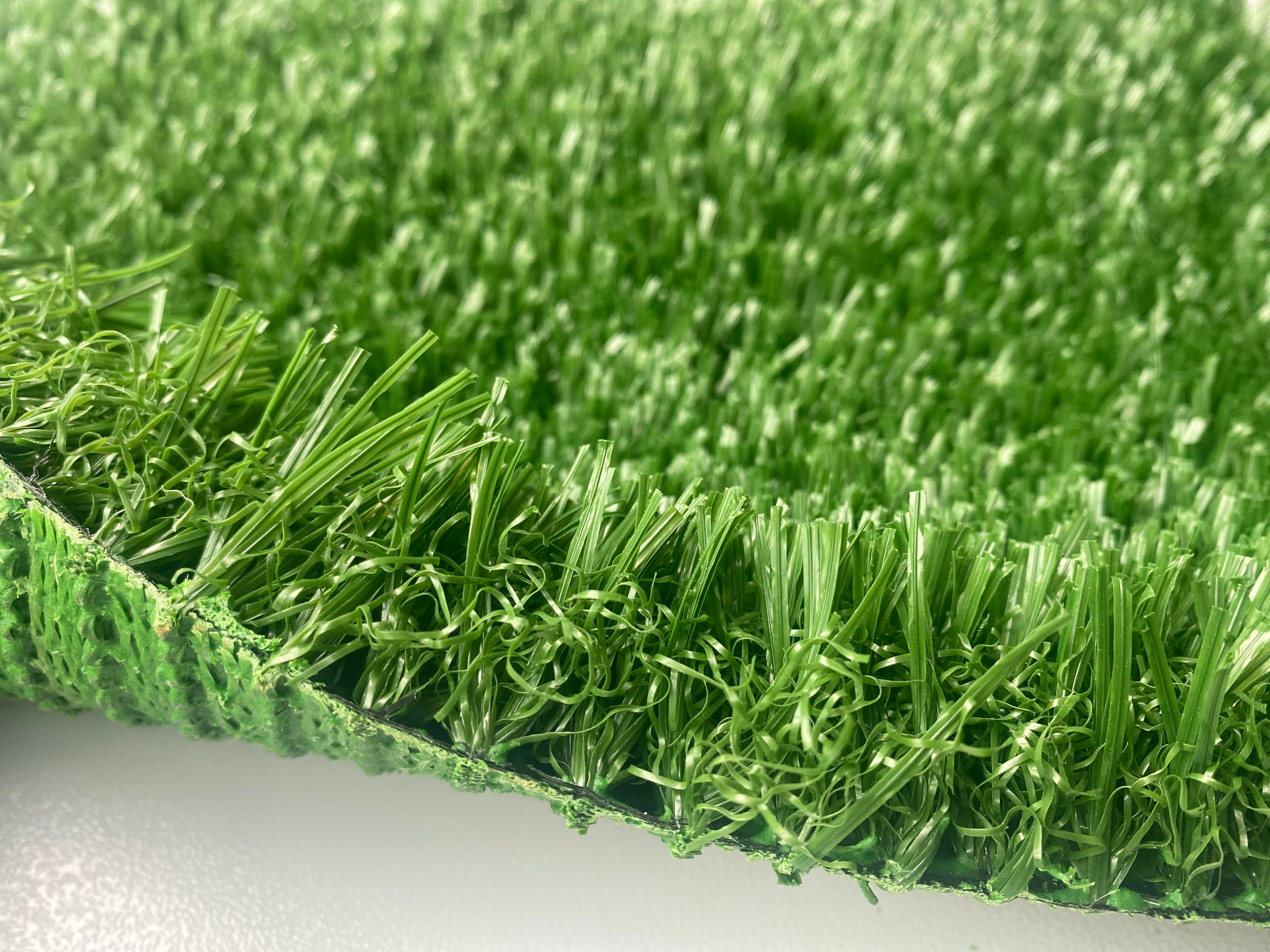 足球假草皮多少钱一平,足球场天然草皮多少钱