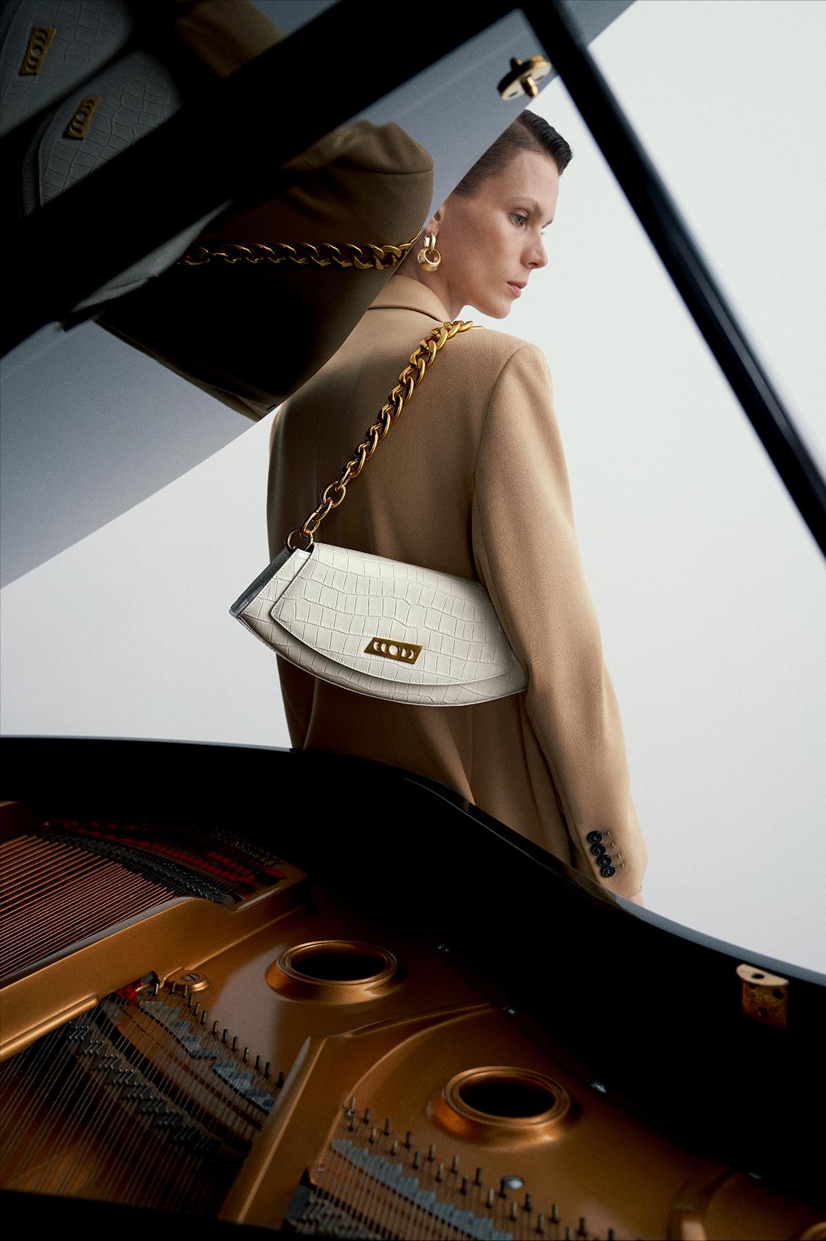 40到50岁女人适合背什么包包,40岁女性背什么牌子的包包