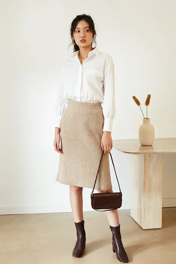 穿裙子靴子过年,过年穿了裙子显瘦