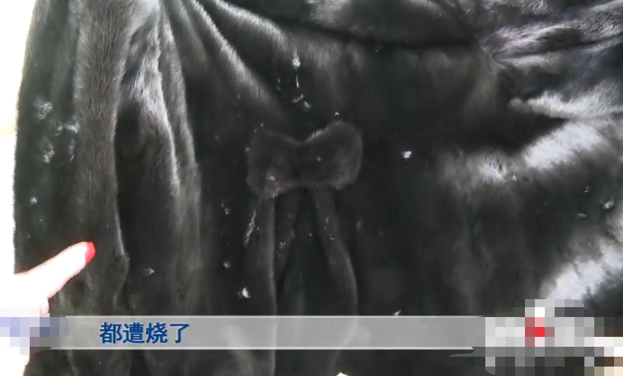 重庆一女子16000元的貂皮大衣被烧出20多个洞，对方表示愿意承担责任赔偿500元，女子：500修不好，我不要钱