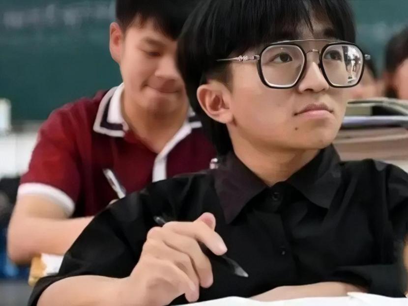 扭扭车男孩张亮哪里上大学,宿松县残疾人张亮