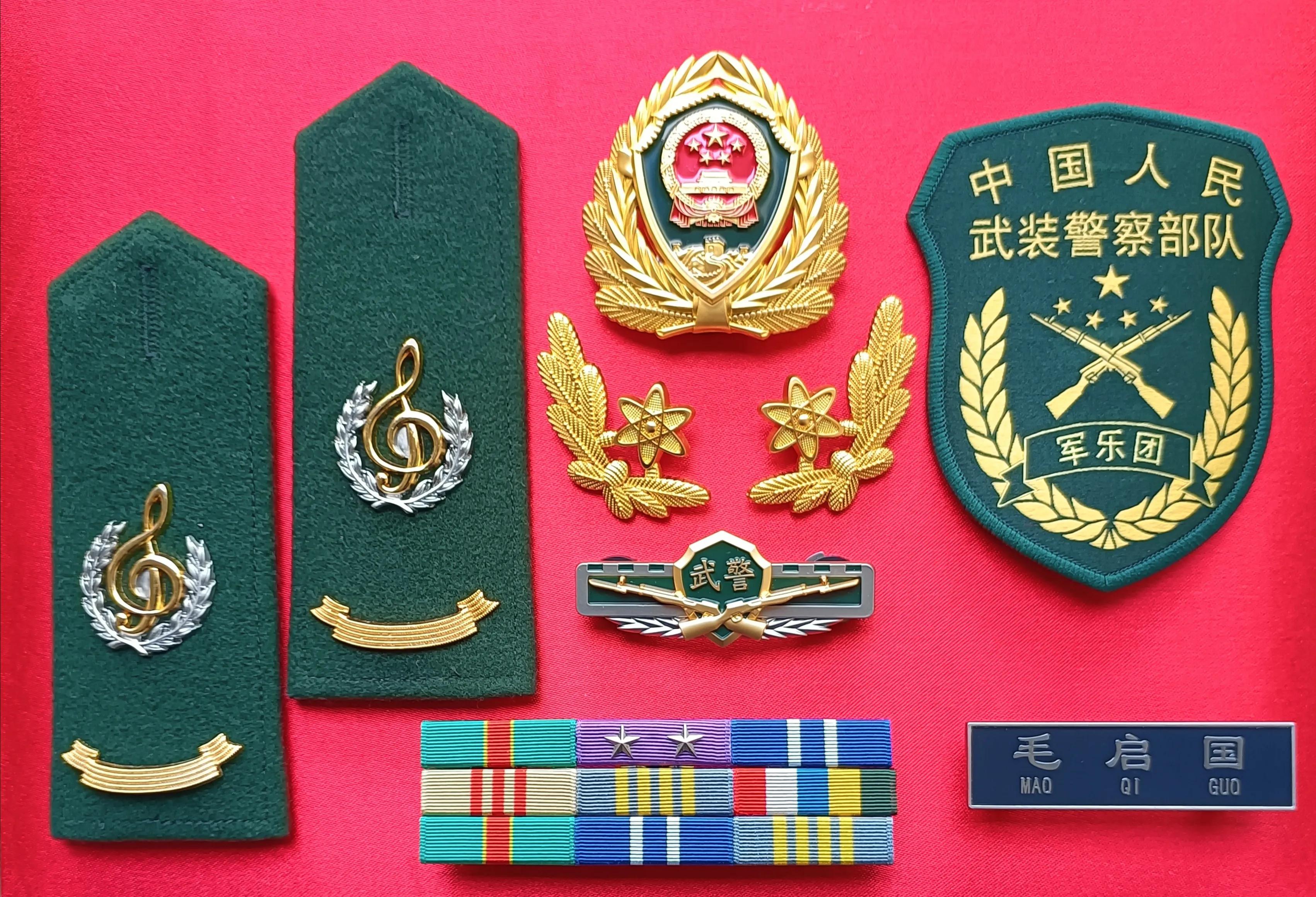 毛启国收藏帽徽图片,中国陆军狼牙特种部队肩章图片